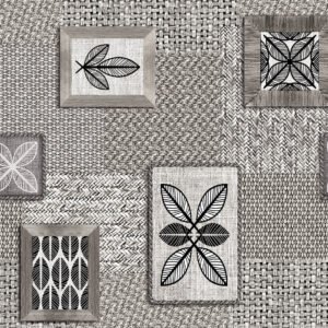 Modern wipe clean tablecloth with a woven pattern and black botanical motifs on a textured grey background