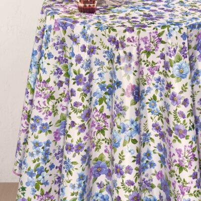 wipeable tablecloth on round table , blue and purple flowery pattern