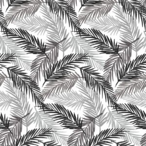 Patterned PVC tablecloth featuring overlapping tropical leaves in various shades of grey and black on a white background